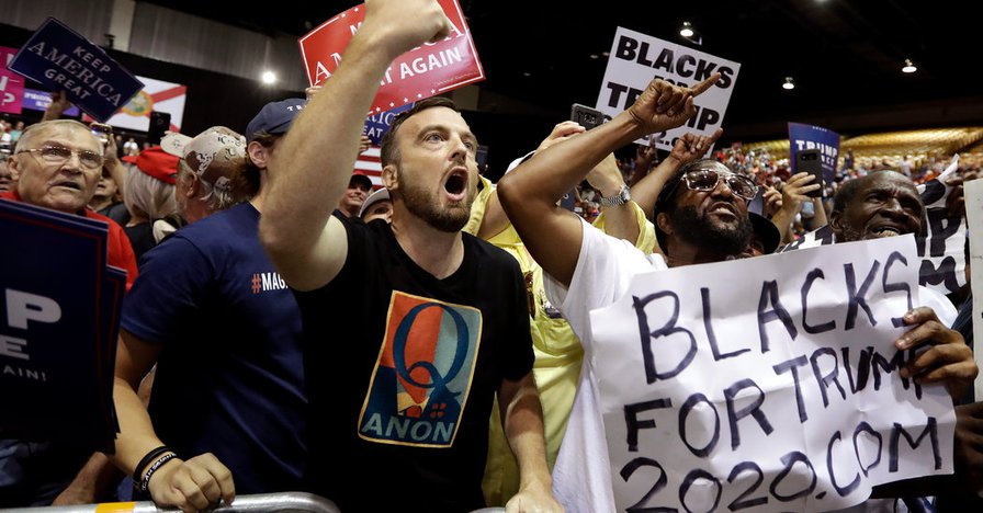 What Is QAnon: Explaining the Internet Conspiracy Theory That Showed Up at a Trump Rally - The New York Times